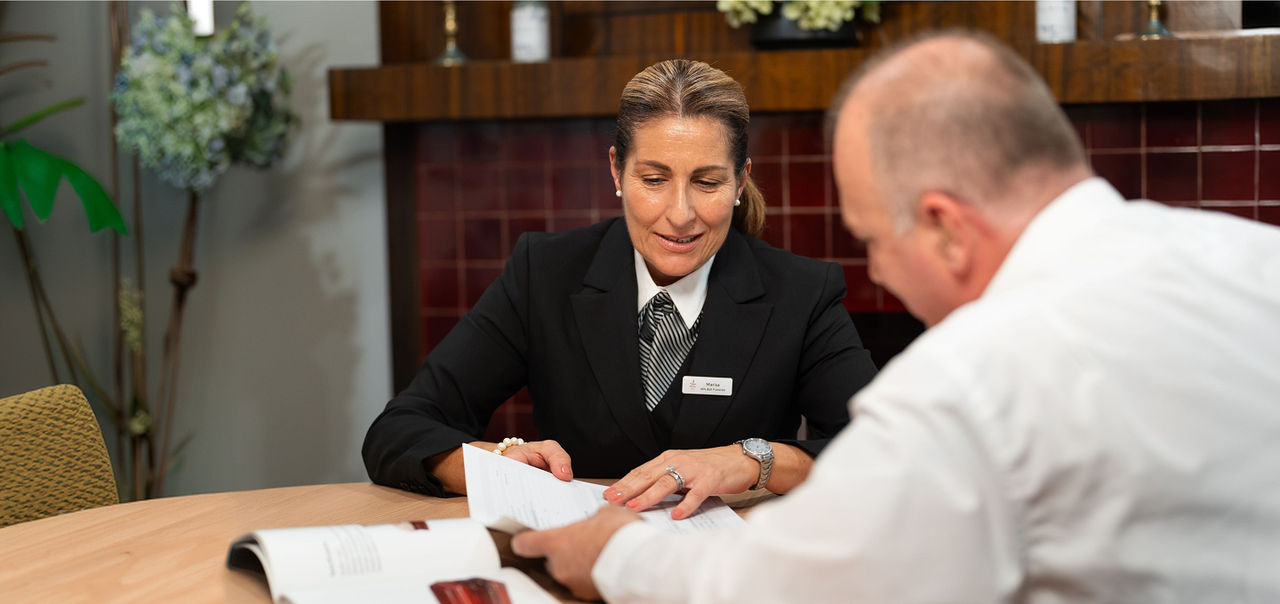 funeral director with man